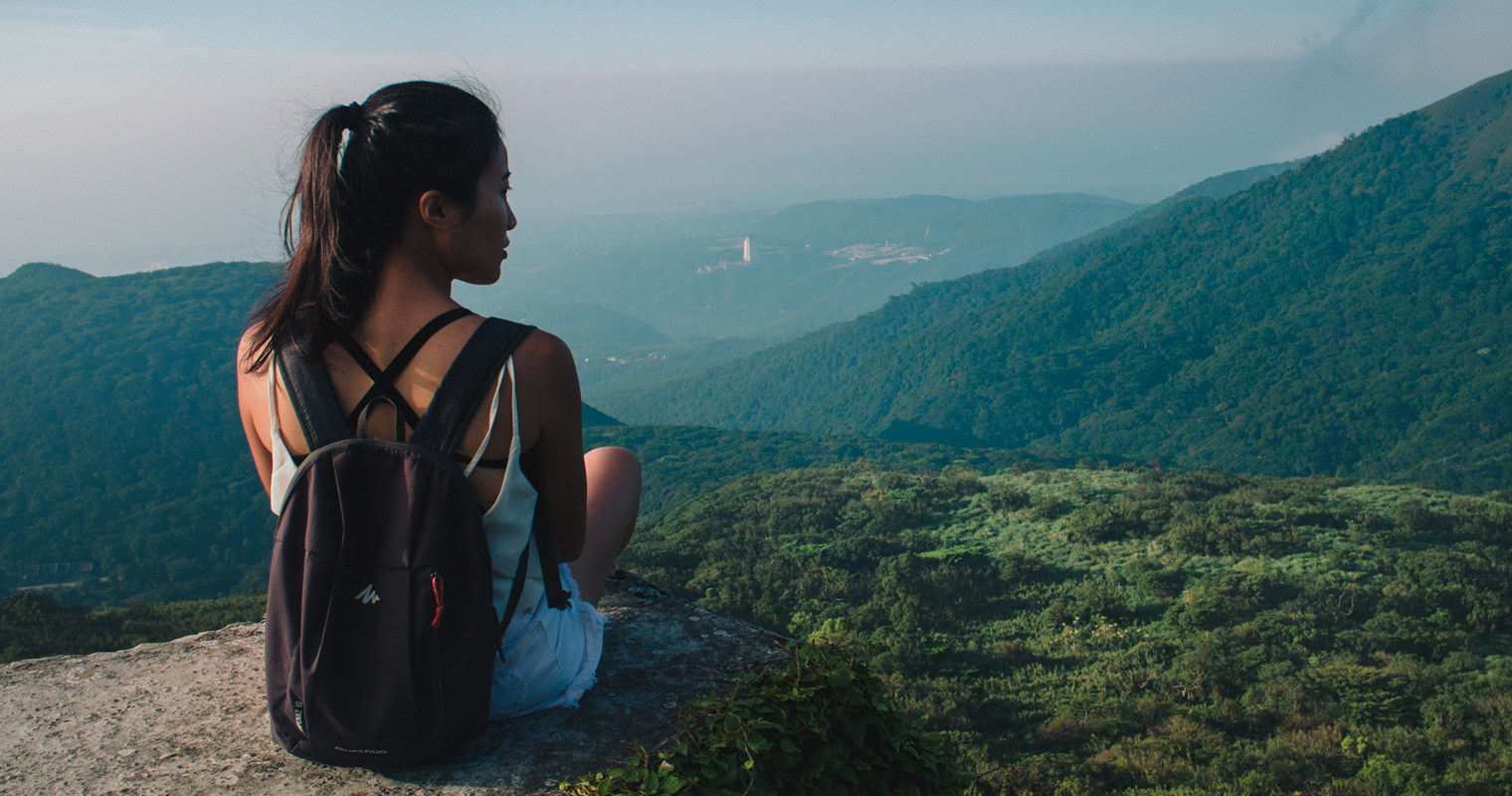 Girl at lookout point in Asia