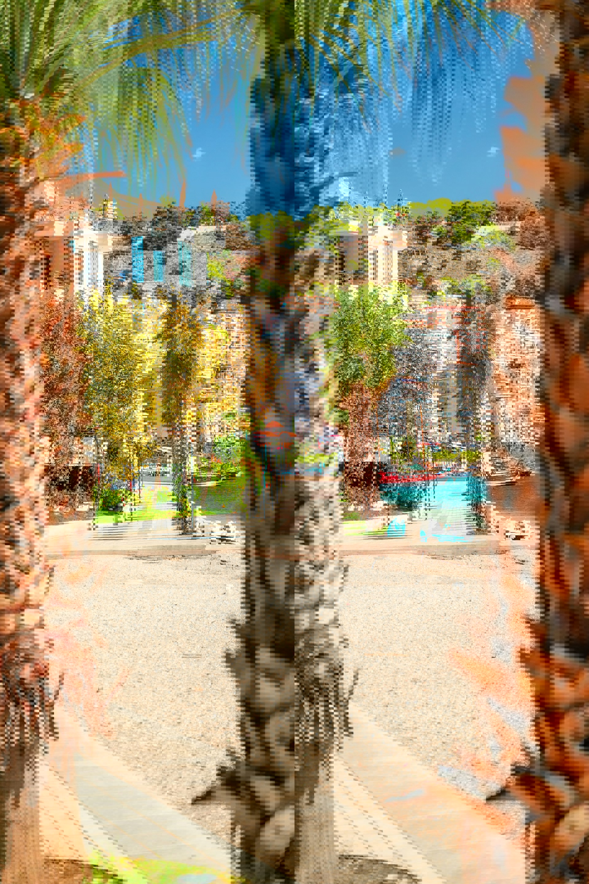 promenade at among boats and buildings in Saranda