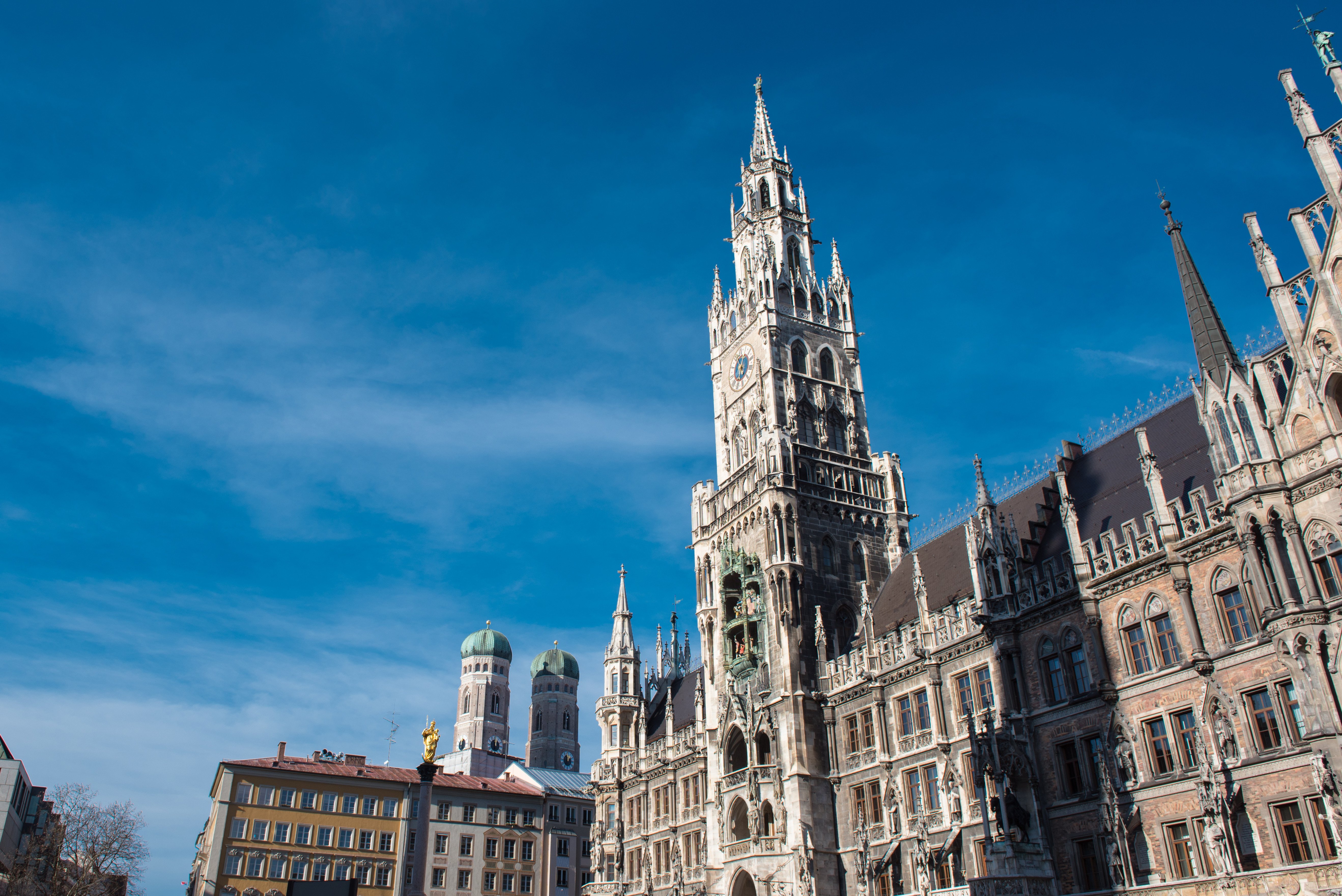 Gothic architecture of the New Town Hall in Munich, Germany, under a clear blue sky